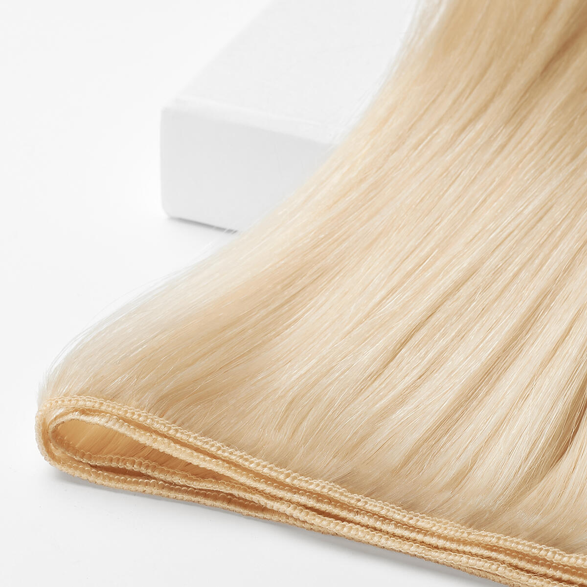 Premium Weft Extensions - Single Layer 10.10 Platinum Blonde 60 cm
